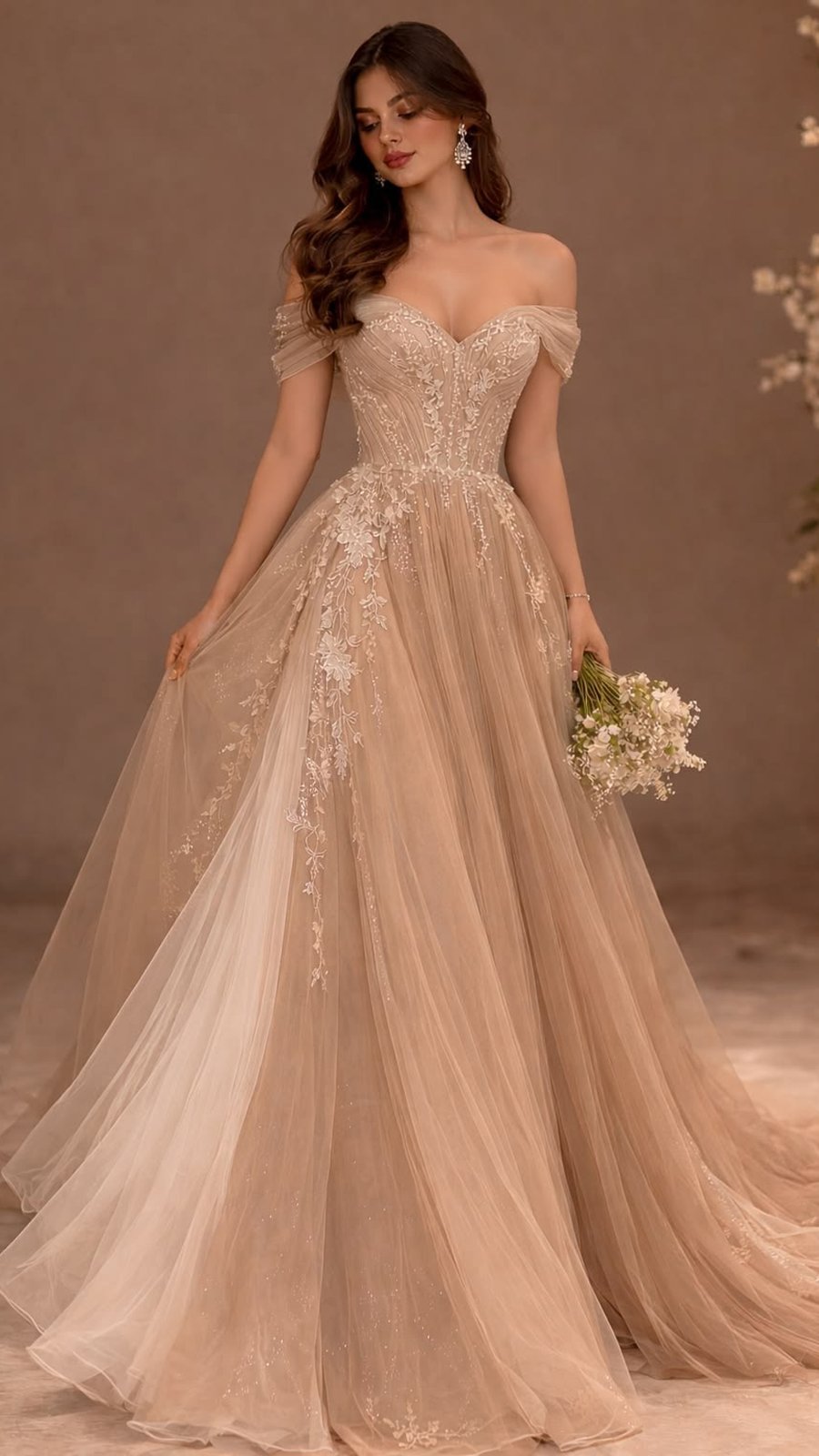Vestido de novia en tono nude con hombros caídos y falda de tul